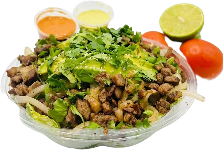 Brisket salad bowl loaded with chopped brisket, avocado, cilantro, lettuce, onions and salsas